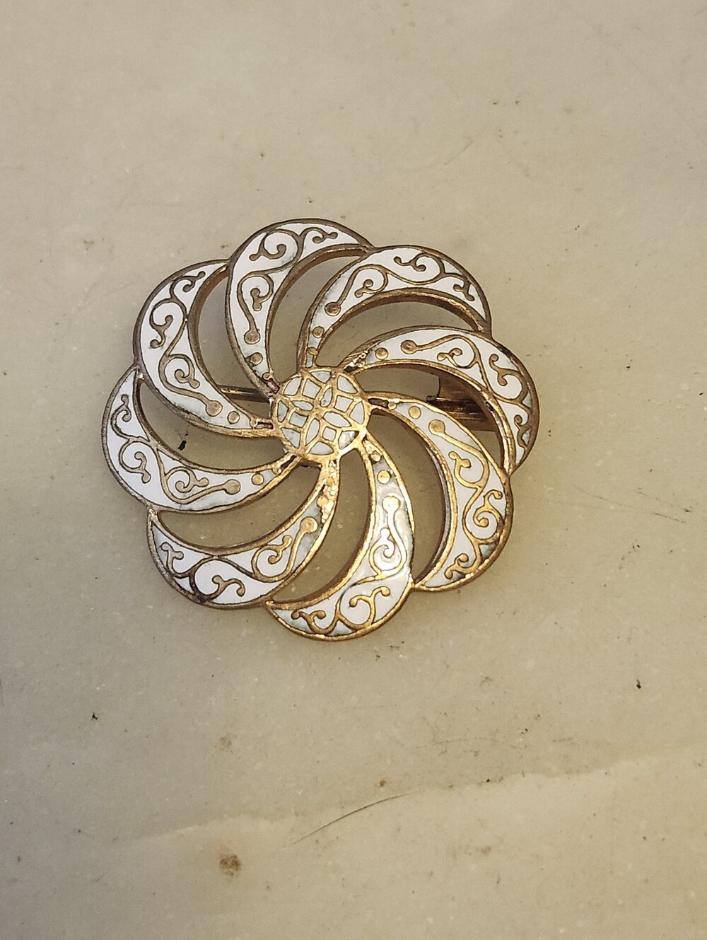 Gold-Tone White Enamel Floral Swirl Brooch